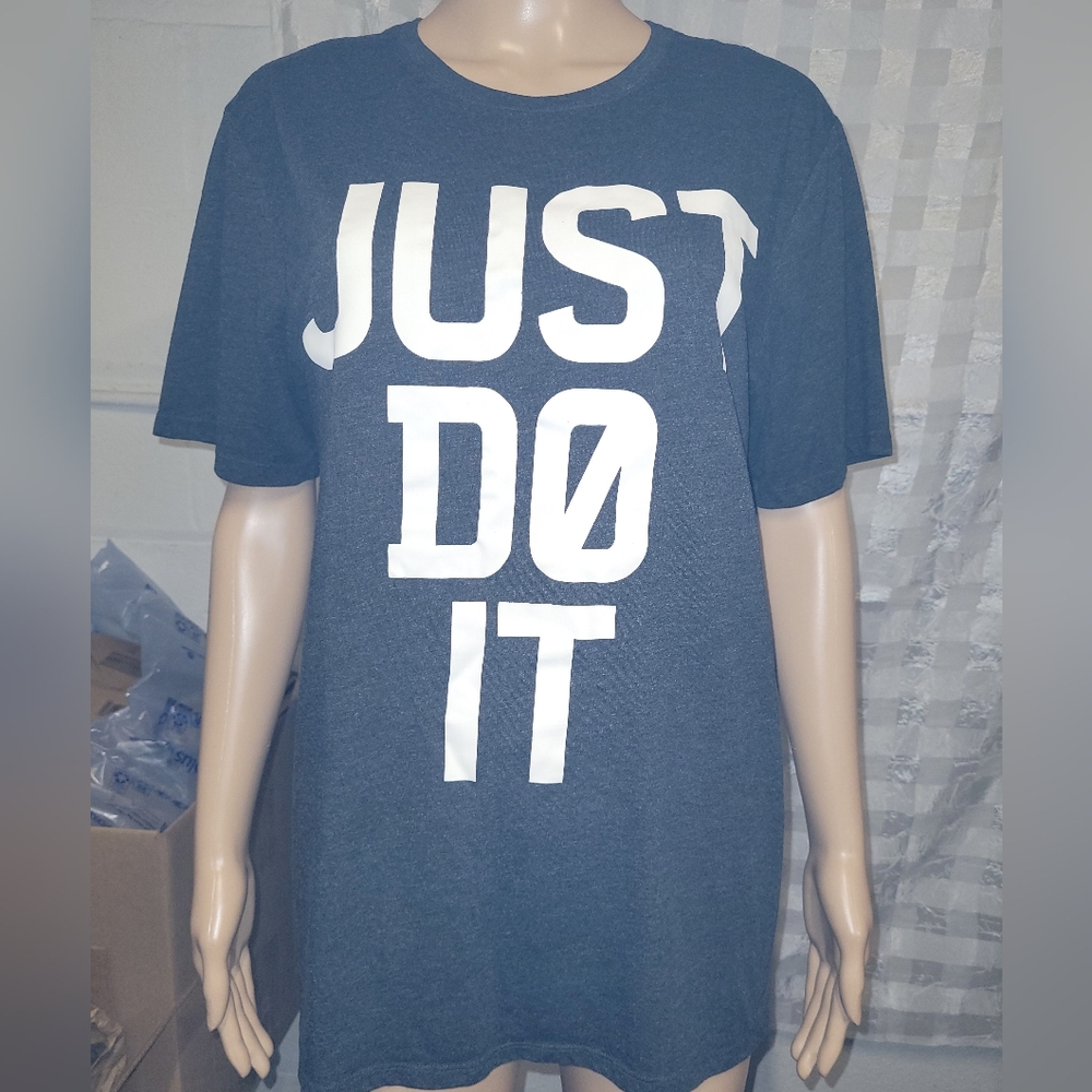 Nike Brand "Just Do It" Size M. Black W/White Letters Tee Shirt.